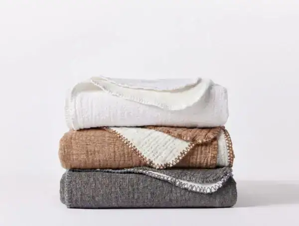 pdp cozy cotton throw stack multicolor sp23 09267 2ae16881 b3fb 4bec b12b 75bc17ad19a0